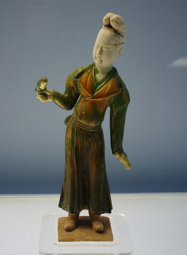 彩色釉陶托鸚鵡女俑