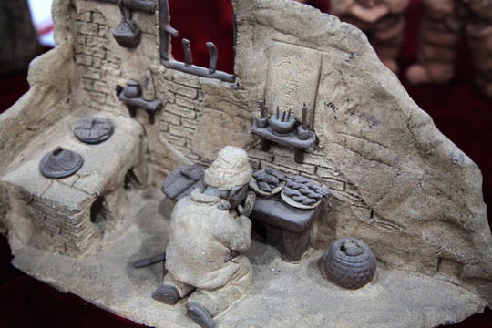 泥塑臘月祭灶場景