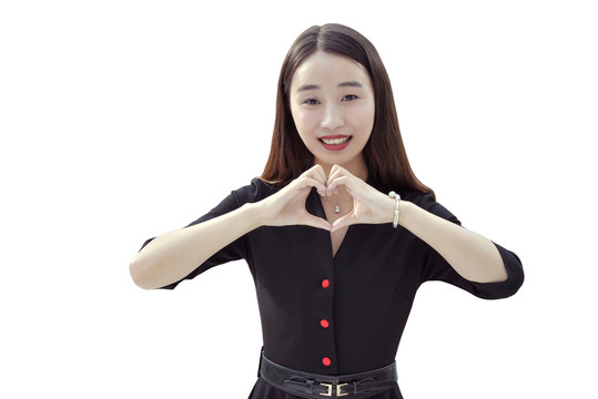 做愛心手勢的女人