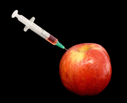 紅蘋果與注射器的黑色