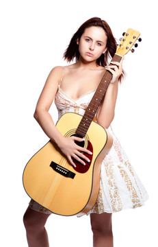 美麗的女人帶著吉他