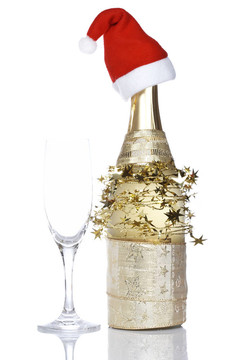 帶紅色圣誕帽的香檳酒瓶