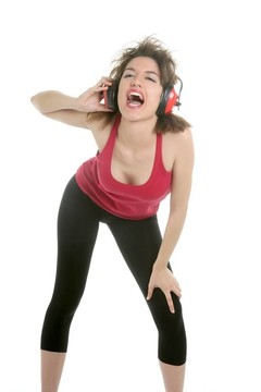 美麗的性感女人與安全耳機(jī)
