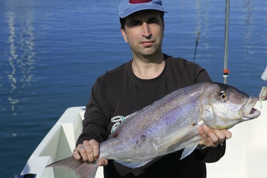 漁民引引傲釣鹽水魚(yú)