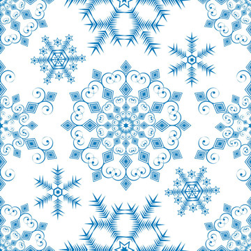 無縫的圣誕圖案從藍色雪花