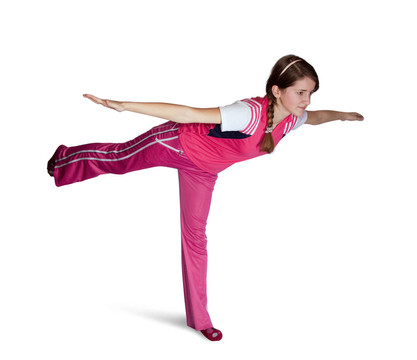 穿粉紅色運(yùn)動(dòng)服的運(yùn)動(dòng)女孩。分離