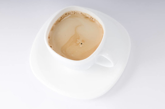 板特寫白色咖啡杯