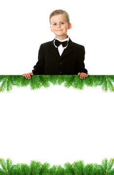 拿著圣誕旗幟的男孩