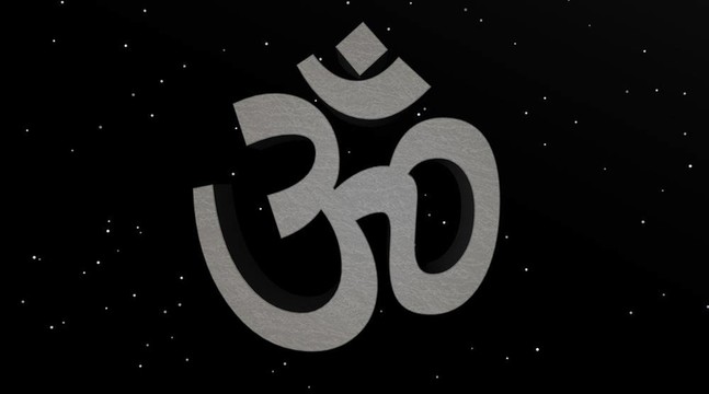 灰色AUM / OM在夜晚