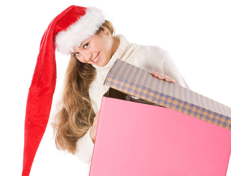 迷人的女孩在Santa與裝飾盒帽子
