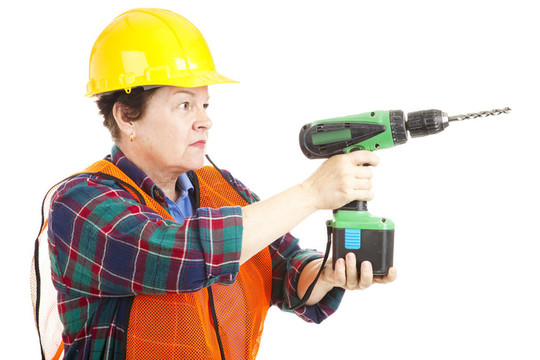 女建筑工人鉆井