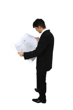 一個成功的商人看建筑圖