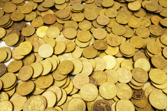 白色的一堆金色的硬幣