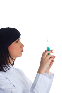 婦女檢查注射器孤立的白色