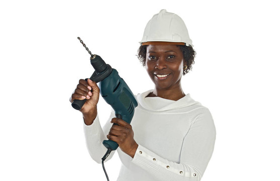 戴頭盔和工具的女人