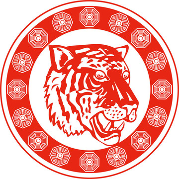一個(gè)老虎正面面對(duì)一個(gè)裝飾圓形邊框的正面插圖
