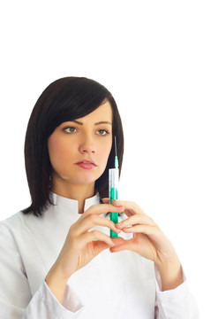 婦女檢查注射器孤立的白色