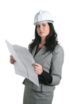 建筑師的女人白的安全帽和計(jì)劃
