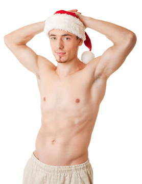 赤裸軀干和Santa帽的運動員