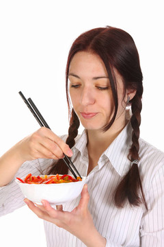 美女用筷子吃飯