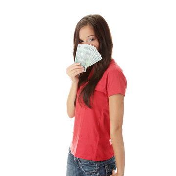 活潑的年輕女士拿著現(xiàn)金