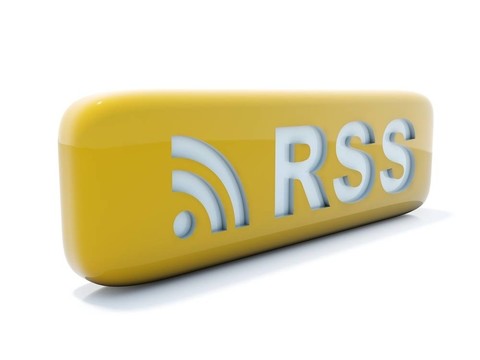 有光澤的黃色的RSS圖標(biāo)白色隔離