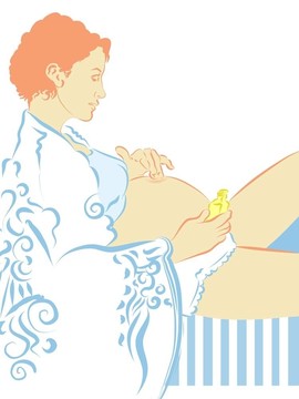 孕婦用橄欖油按摩她的腹部
