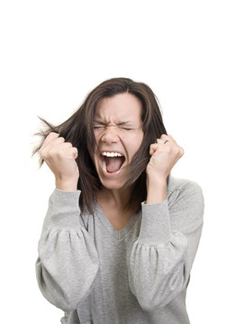 女人尖叫和拉扯她的頭發(fā)沮喪