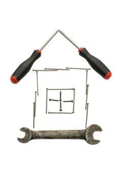 房子從建筑工具孤立在白色