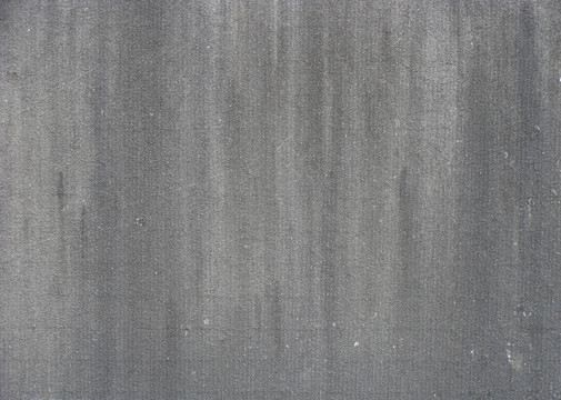 骯臟的灰色磨損的墻壁與污垢滴
