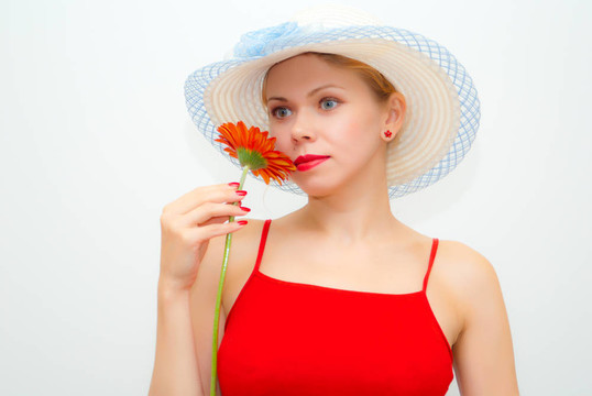 有吸引力的；年輕女孩與flower Gerbera