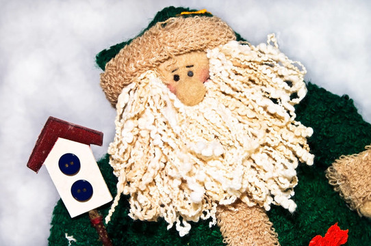 云背景上的Santa Claus Doll