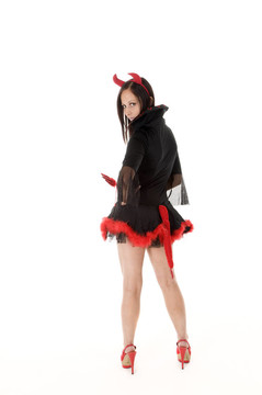 性感女人在惡魔服裝后視圖