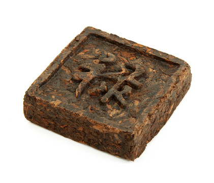 用象形文字在白色背景的綠茶壓型煤