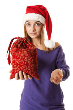 美麗的女孩在紅色Santa帽