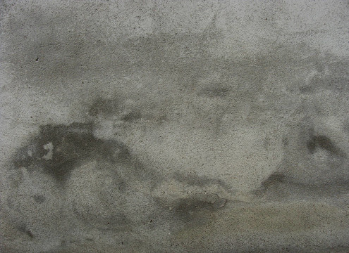 骯臟的灰色混凝土墻，呈波浪狀