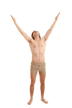赤裸的年輕英俊男子舉起手臂