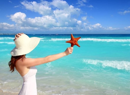 海灘帽子女子海星在手熱帶加勒比