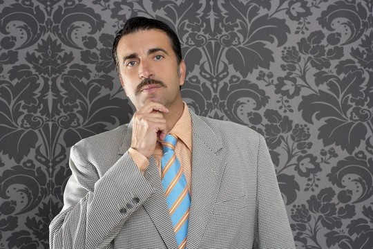 書呆子商人沉思的手勢傻傻的有趣的復古