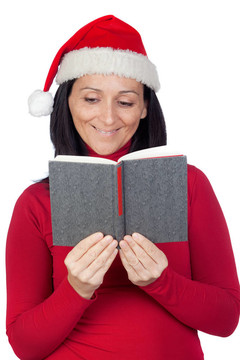漂亮女孩帶圣誕帽看書