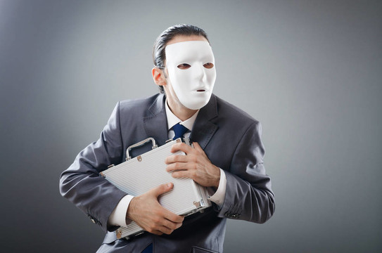 工業(yè)espionate概念與蒙面的商人