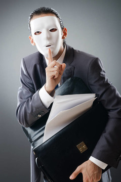工業(yè)espionate概念與蒙面的商人