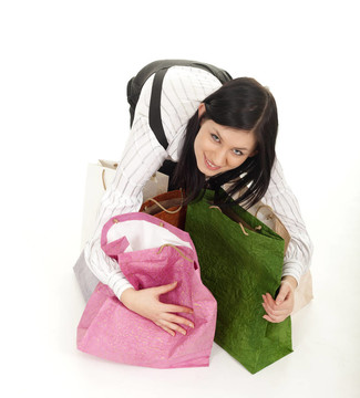 帶購(gòu)物袋的年輕女子；白色背景