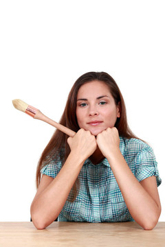 用畫筆的女人