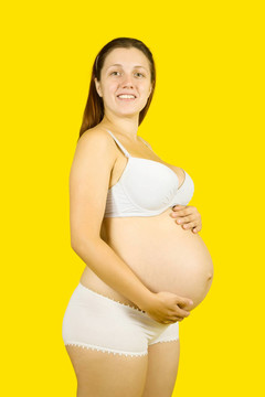 抱孕婦肚子的女人