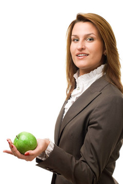 商女士拿着绿苹果