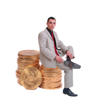 商人坐在金幣上