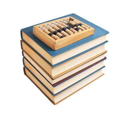木制算盘在一堆书