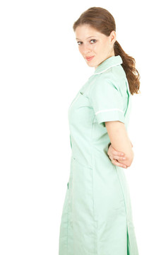 一位美麗的女性醫(yī)療保健醫(yī)生穿著藍(lán)色制服