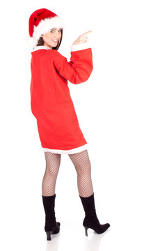用紅色Santa衣服和帽子指著年輕女子